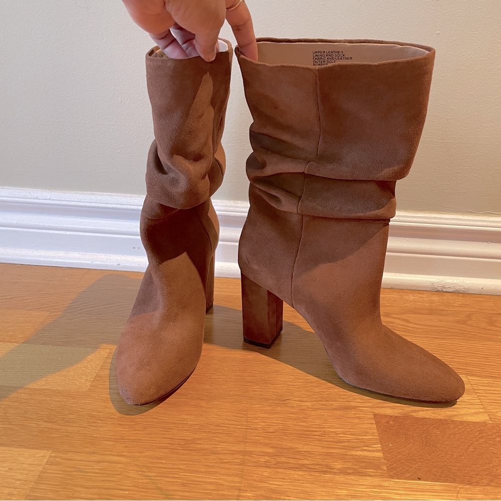 Midshaft suede boots in tan.